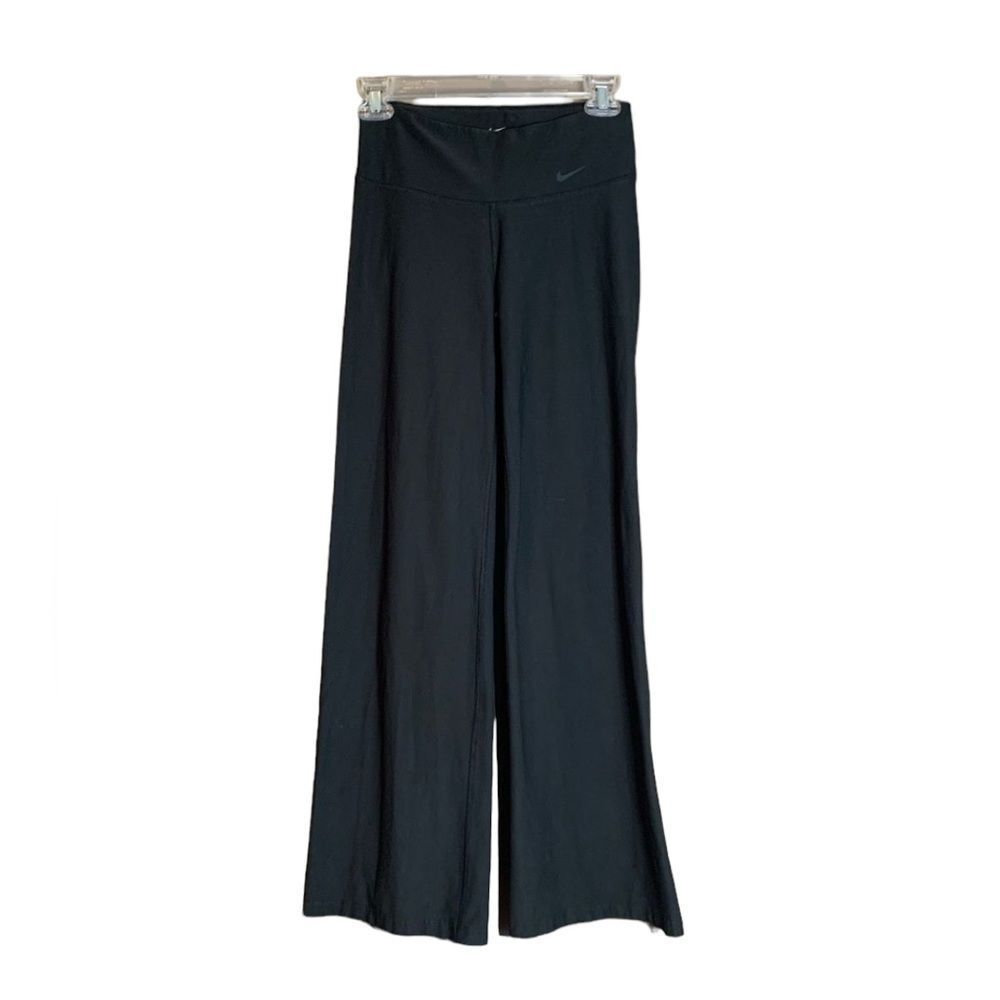 Nike black boot‎ cut work out pants.